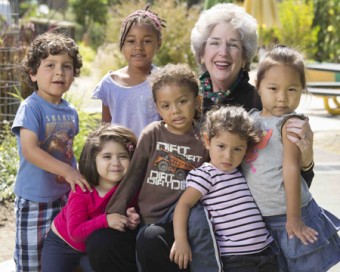 Carol Corrigan with Kids from Saint Vincent's Day Home