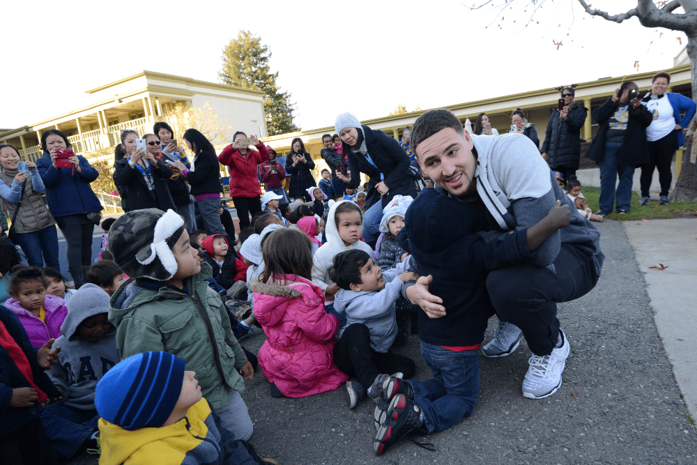 Klay Thompson With Children From Saint Vincent'S Day Home Toy Donation Event
